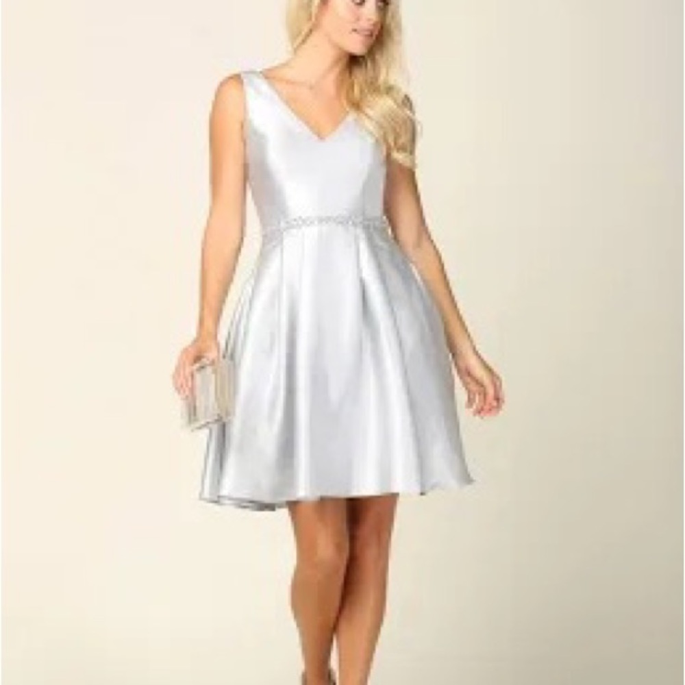 Moochi from New Zealand stunning silver dress with gorgeous lining.